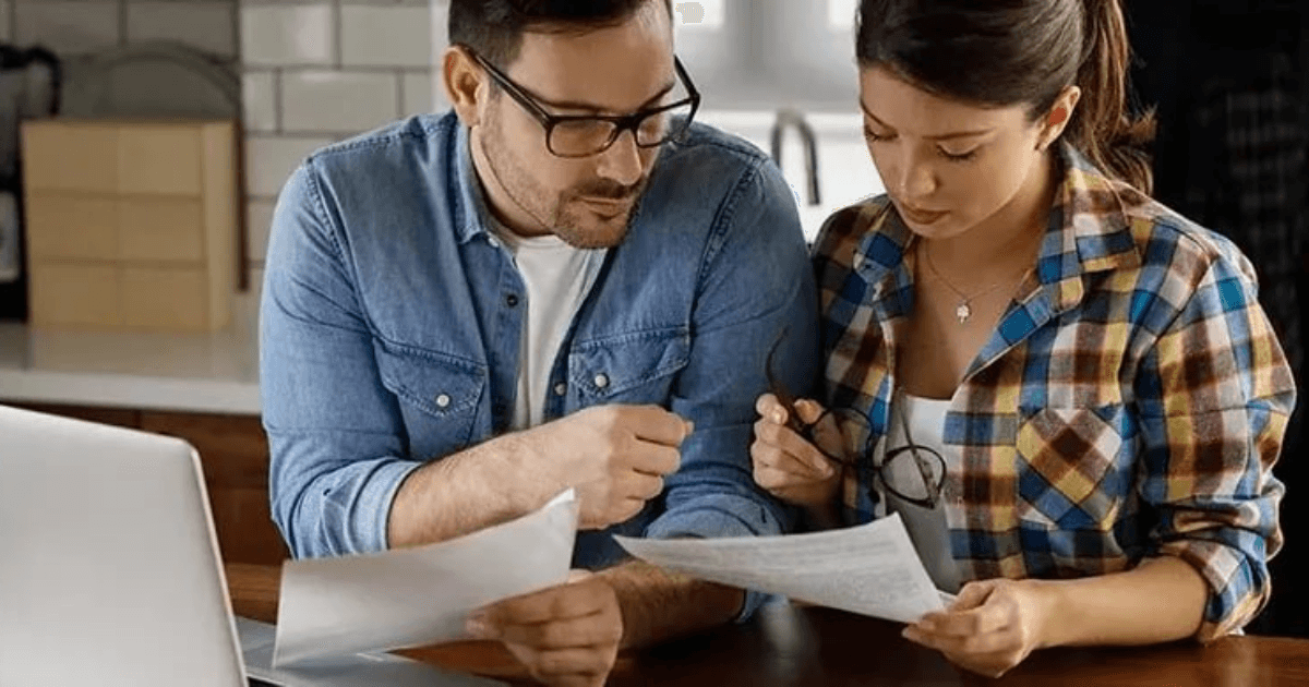 Couple reviewing bills together
