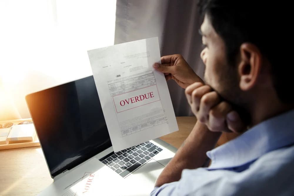 Person concerned about overdue bills